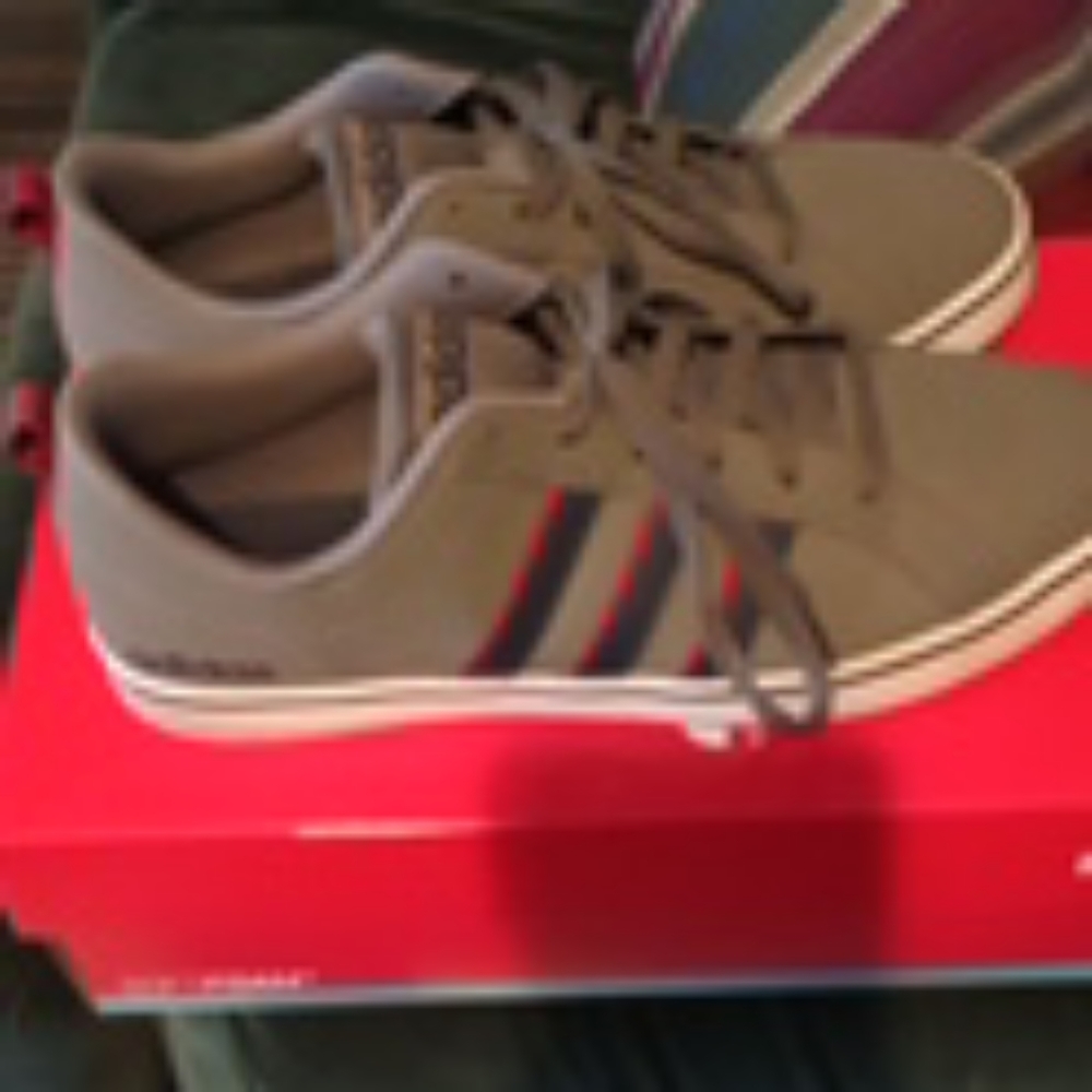 I'm selling a pair of adidas tennis shoes